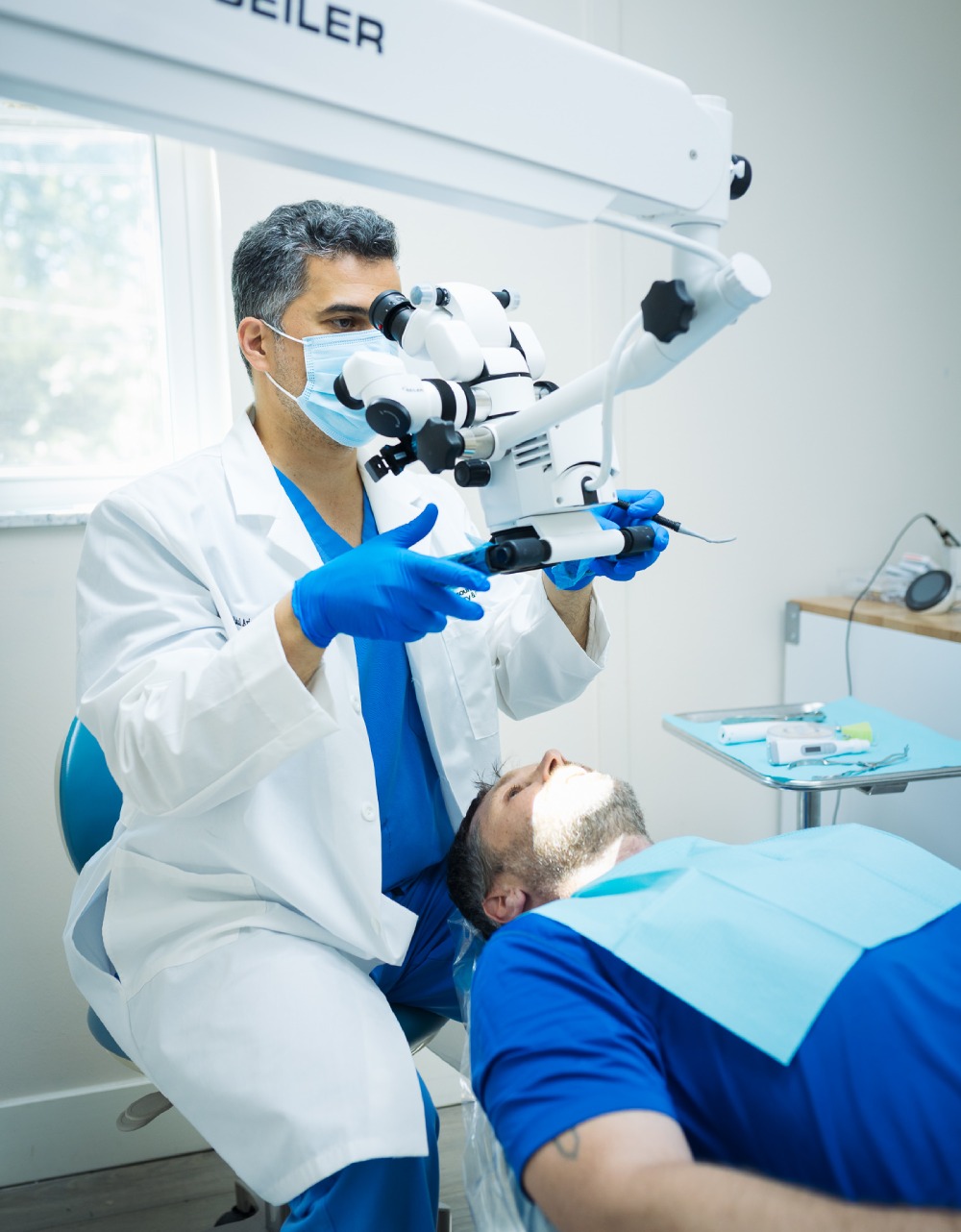 Dentist using advanced tools for fast dental care treatment